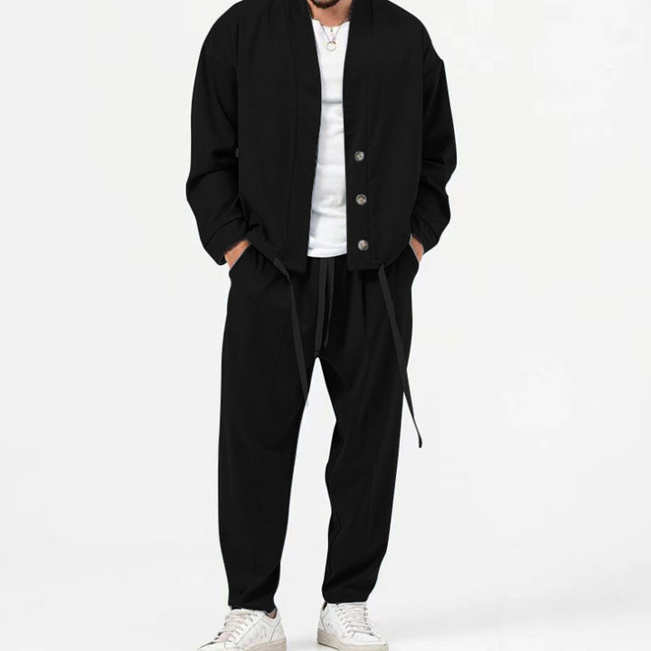 Men's Korean Style Suit Set | Coordinated Two-Piece — black set shown from the front with a white shirt and light sneakers